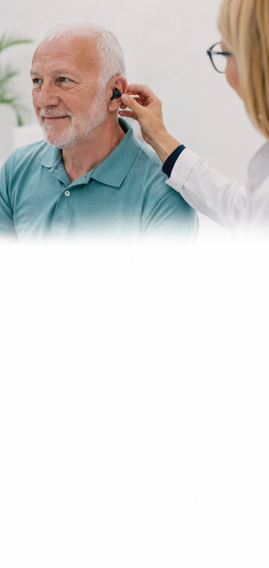 Senior wearing audiometry headphones during a hearing test